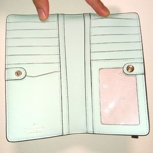 Kate Spade "Darcy" large slim bifold wallet